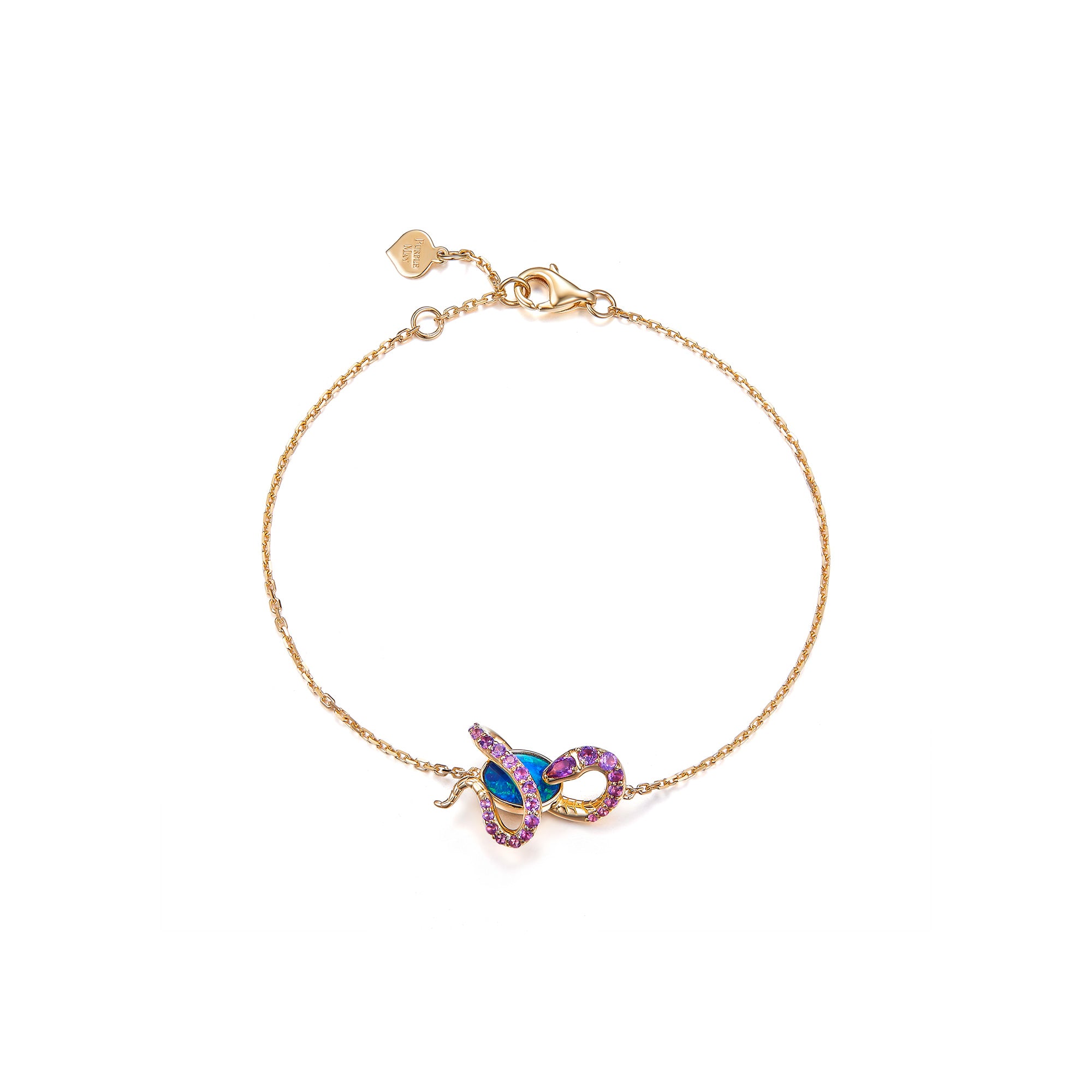 An elegant 18K gold bracelet featuring a snake design wrapped around an oval Australian opal. The snake is adorned with sparkling amethyst gemstones, complementing the vibrant blue-green hues of the opal. The delicate gold chain is secured with a lobster clasp and includes a small heart-shaped tag for a refined touch. This bracelet blends luxury with unique design, perfect for statement styling.